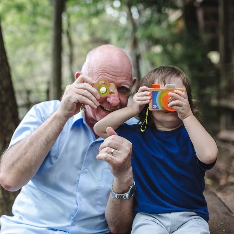 WoodCartoonCameraToy grandfather and  boy